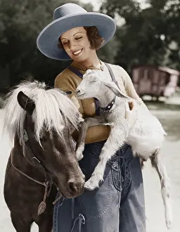 Warranties: Woman with goat and pony