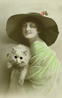 Hand Tinted: Woman with google-eyed cat