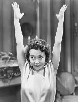 Successes: Woman with hands in the air