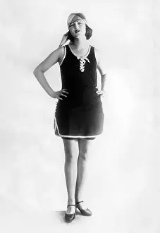 Akimbo: Woman with hands on hips