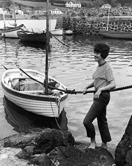 Coverack: Woman in harbour, Coverack, Cornwall