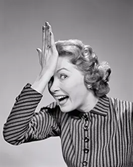 Exasperated: Woman Hitting Forehead with Heel of Hand As If