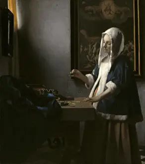 Vermeer: Woman Holding a Balance