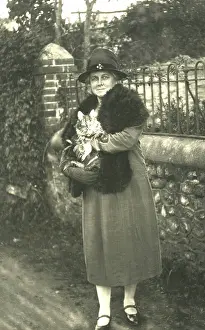 Portait: Woman holding a cat