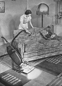 Cleaners: Woman hoovering