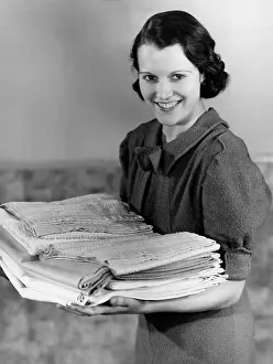 Ironed: WOMAN WITH IRONED TOWELS