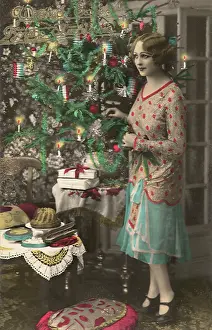 Candies: Woman and Lit Tree