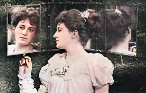 Hath: Woman looking through mirror at her reflection