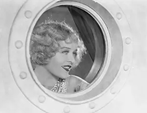Ecovgc0176: Woman looking through porthole
