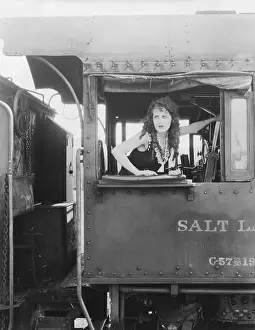 Unsafe: Woman looking out train window
