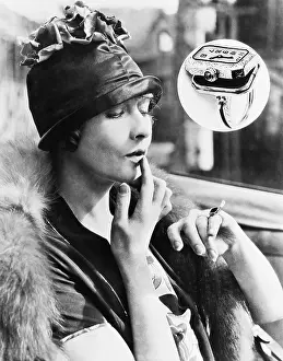 Timepiece: Woman looking at a watch ring