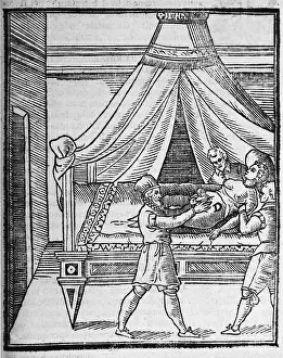 Obstetrics: A woman lying on a bed is being restrained ?