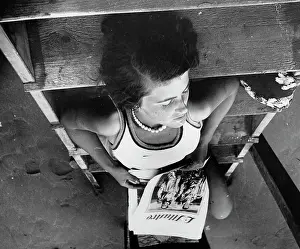 Periodicals: Woman with magazine