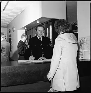WOMAN MAKING REPORT