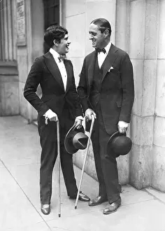 Bowlers: Woman and man in suits, 1926