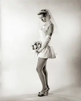 Provocative: Woman Model Bride looking at Camera