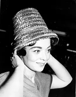 Modeling: Woman modeling straw hat