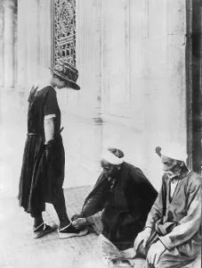 Attracted: Woman in front of a mosque in Egypt, 1924