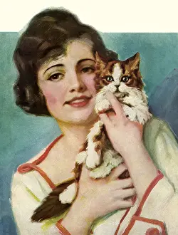 Nuzzling: Woman Nuzzles Kitten