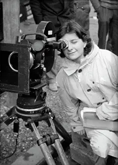 Woman with Old Camera