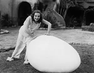 Fertile: Woman outside with giant egg