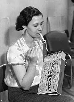 Tabacco: Woman with oversized matches