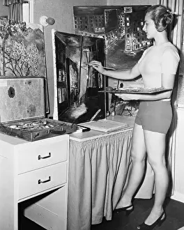Focused: Woman painting