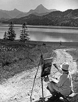 Easel: A woman is painting at the Weiiensee near Fassen, 1934