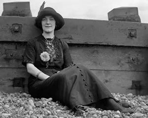 Pebbly: Woman on a pebbly beach