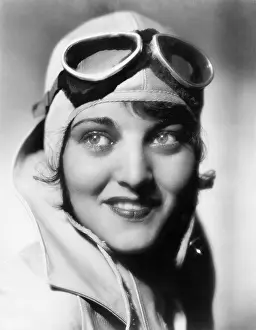 Goggle: Woman with a pilots hat and goggles