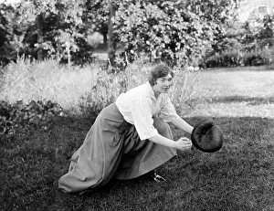 Mitt: Woman playing baseball