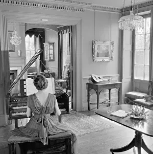 Harpsichords: Woman Playing The Harpsichord