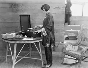 Portability: Woman playing record