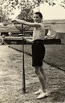 Anglia: Woman poses with fishing nets