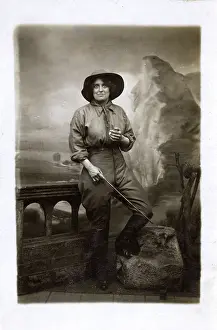 Wide Eyed: A Woman posing as a frontiersperson in a studio