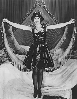 Cheerfulness: Woman posing in party clothes