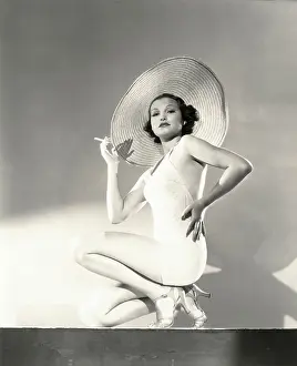 Ov1410: Woman posing in a wide brim hat -
