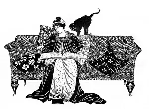 Cushions: Woman reading with cat