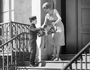 Poise: Woman receiving a present from a young page