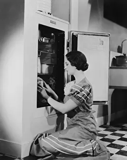 Fridge: Woman with refrigerator