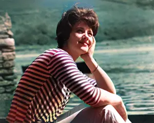 Andrew Besley: Woman relaxing in stripy top