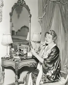 Wiping: Woman removing her makeup