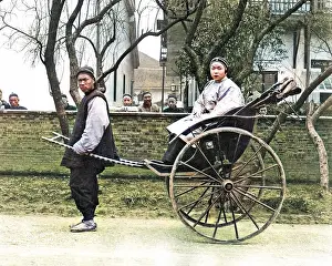 Rickshaw: Woman in rickshaw, China