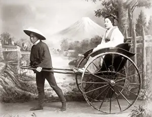 Rickshaw: Woman in a rickshaw in a studio setting, Japan