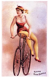Costumed: Woman riding sidesaddle on a boneshaker bicycle