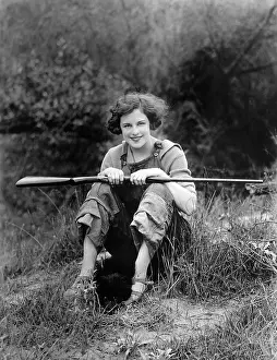 Tomboy: Woman with rifle