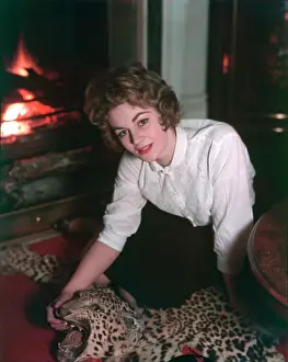 Woof: WOMAN ON RUG BY FIRE