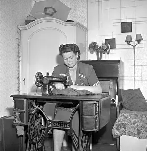 Homemaker: Woman sewing