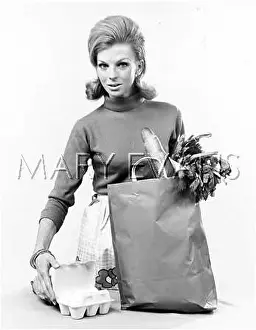 Unpacking: WOMAN WITH SHOPPING