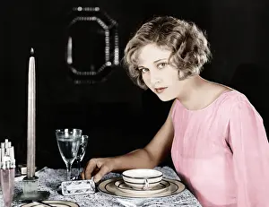 Foodstuff: Woman sitting at the dinner table
